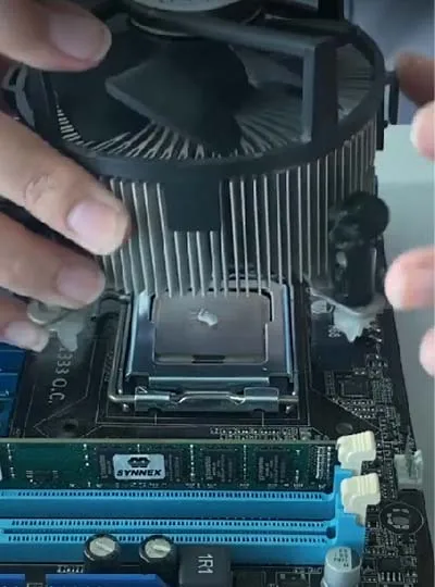 Put the cover back on the heat sink.